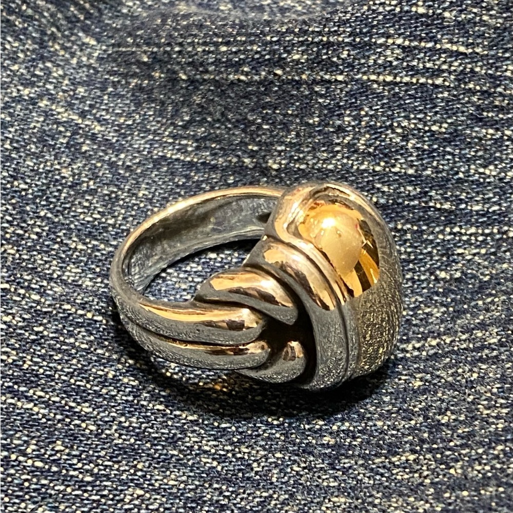 Retired large knot dome ring gold and silver 
Sz 7.    Has a good stamp